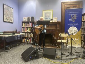 Clare Wettemann performs on April 30 at Huntington Memorial Library, Oneonta, NY.